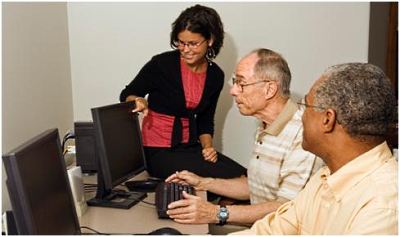 People looking at computer screens